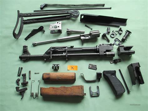 Ak parts kits - Chinese MAK-90 AK47 Parts Kit with Original Populated Barrel, Wood Furniture, matching numbers, 7.62x39, in *excellent* condition. Sold as a KitKit is complete minus the receiver and the stock screws.Includes original Chinese populated chrome lined barrel with trunnion.Standard with the MAK90's, the muzzle is NOT threaded, with the bayonet lug and cleaning rod retainer removed.This is a ... 